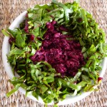 Spicy Red Coleslaw garnished with finely chopped young beetroot leaves